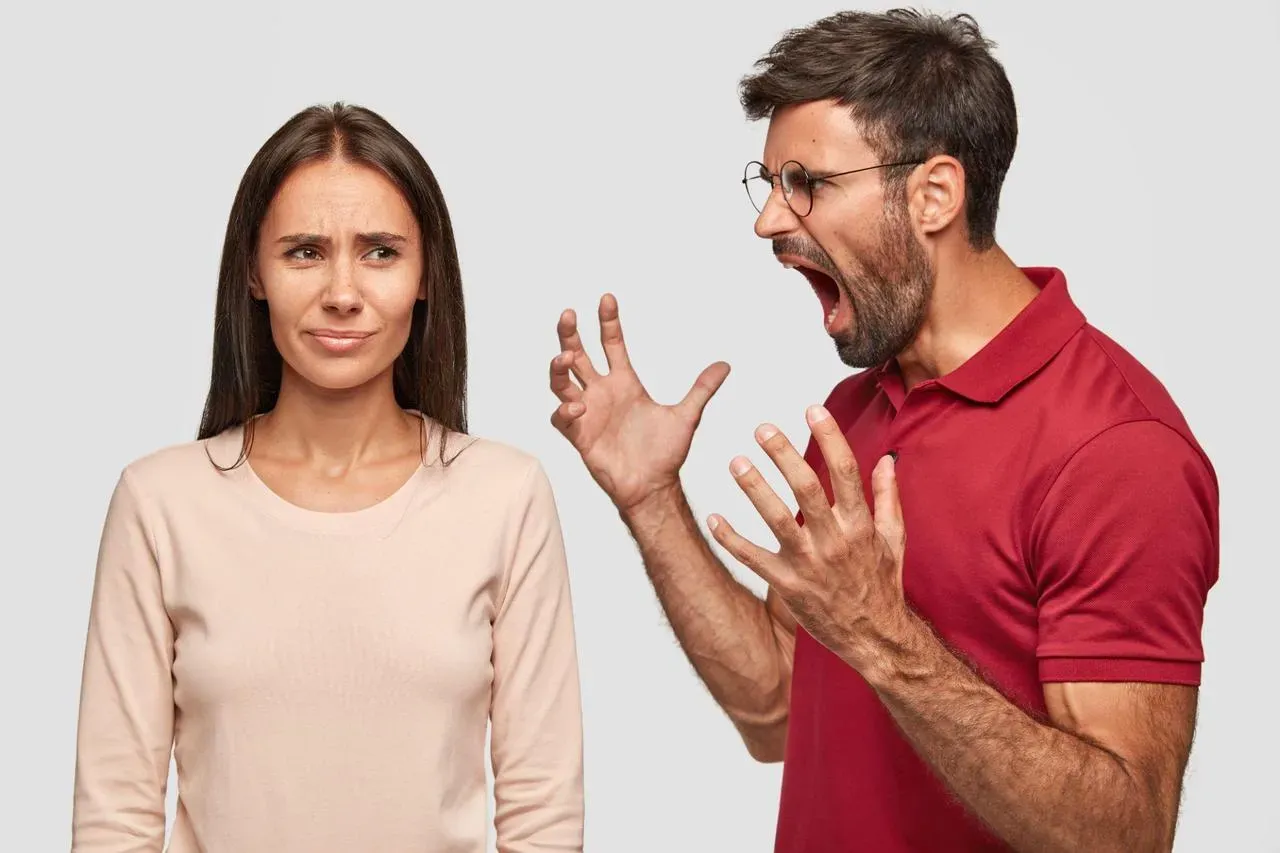 A husband yelling at a wife who wonders