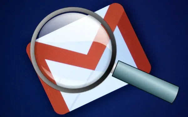 Magnifying glass over a Gmail icon