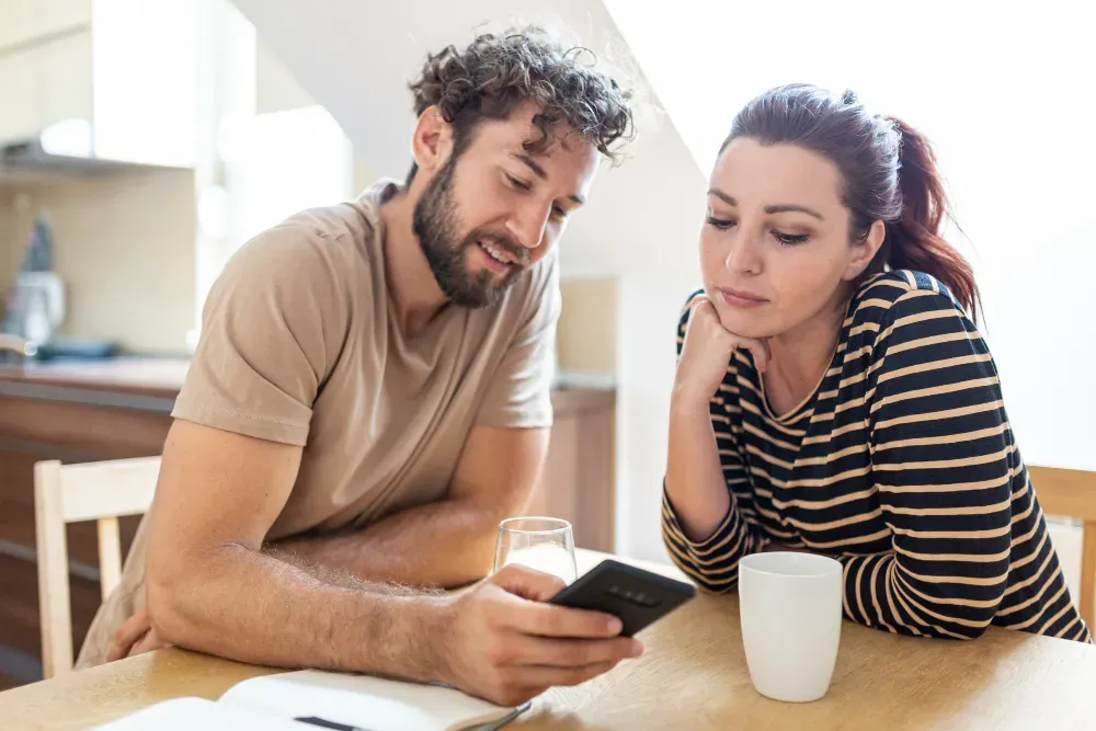 Husband shows wife text messages and calls on his phone