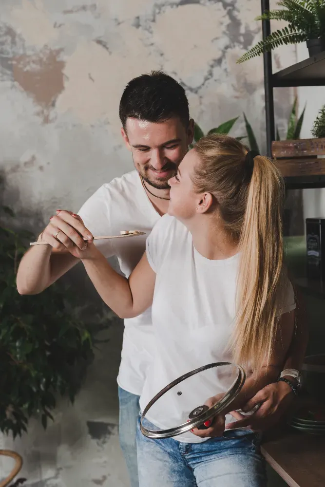 Couple cooking together to repair marriage after cheating